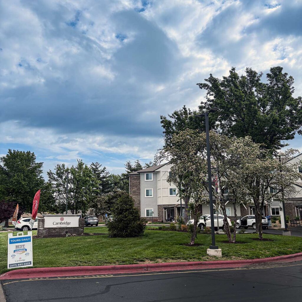 Exterior view of the trees and grounds at The Cambridge.